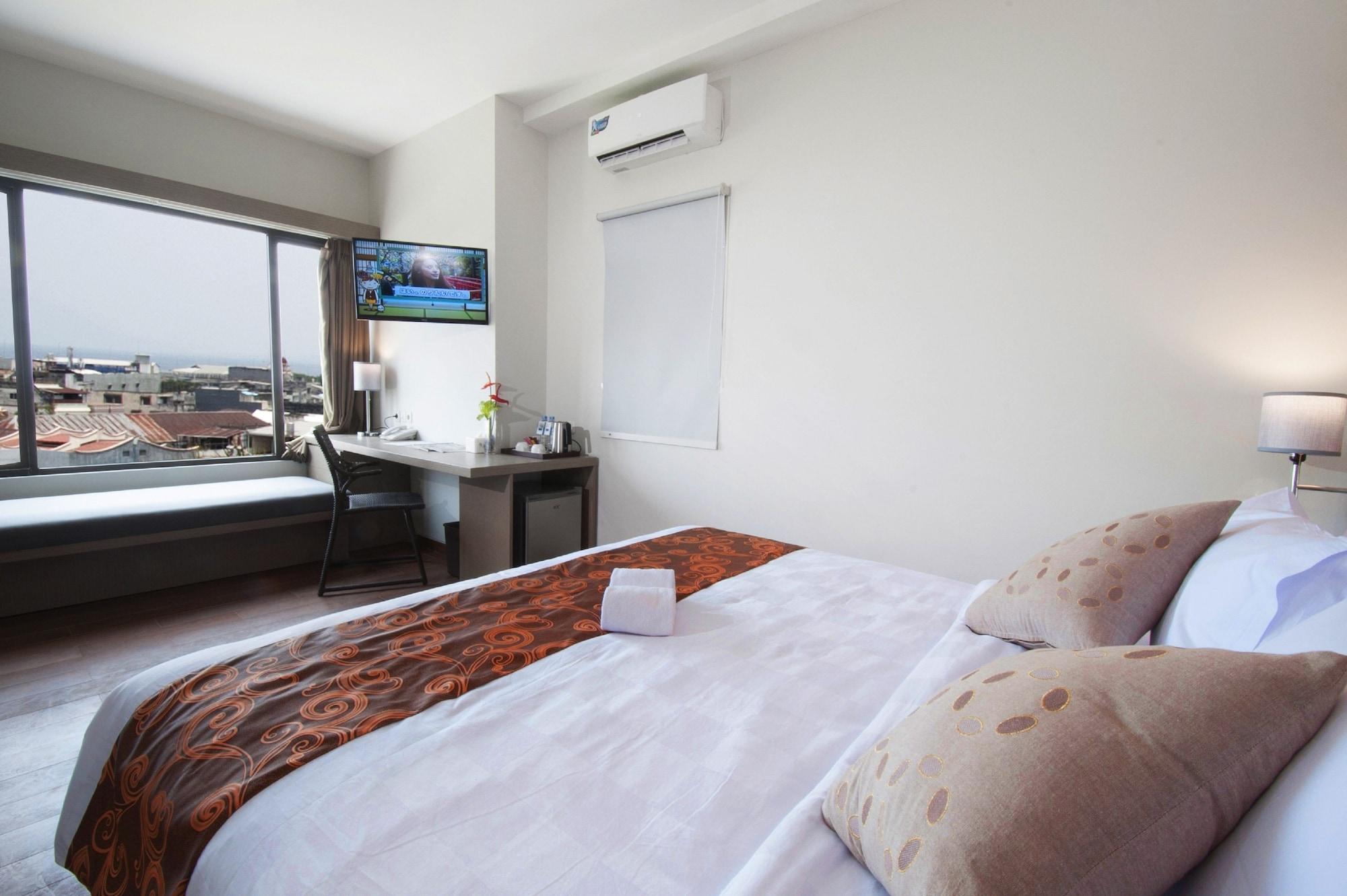 Genio Hotel Manado Esterno foto