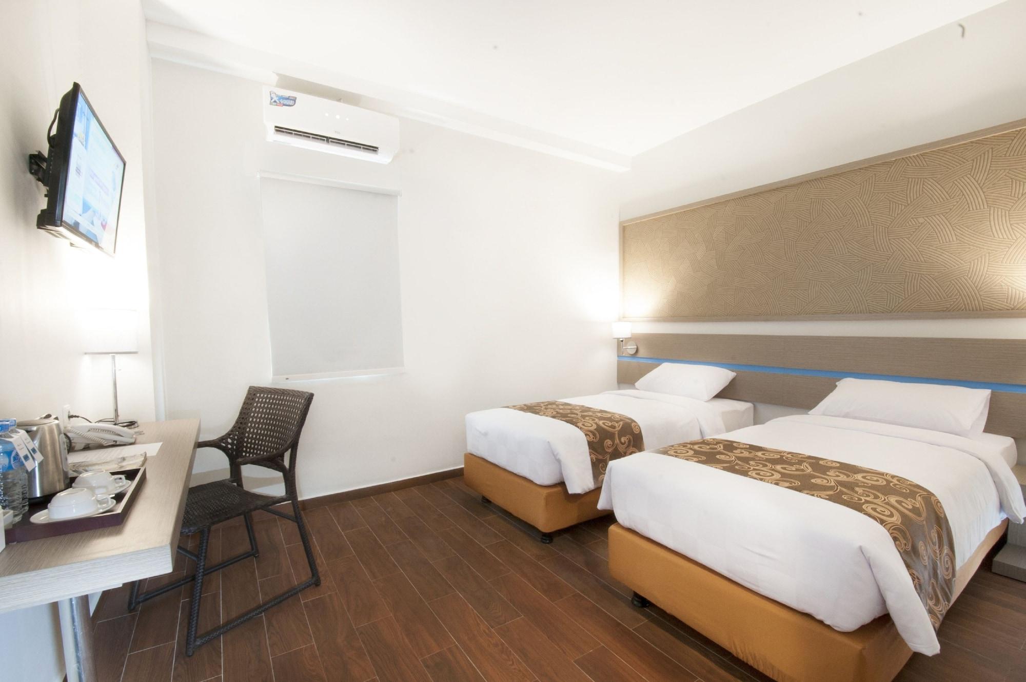 Genio Hotel Manado Esterno foto