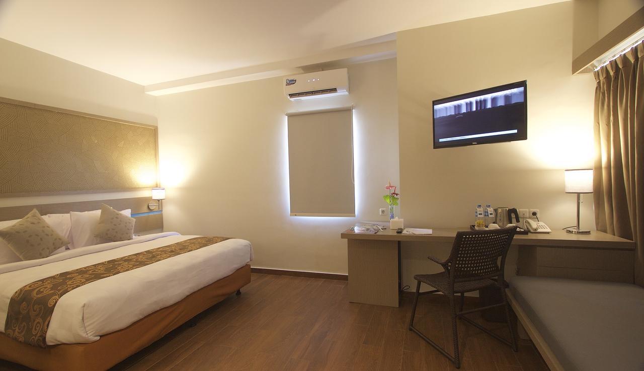 Genio Hotel Manado Esterno foto